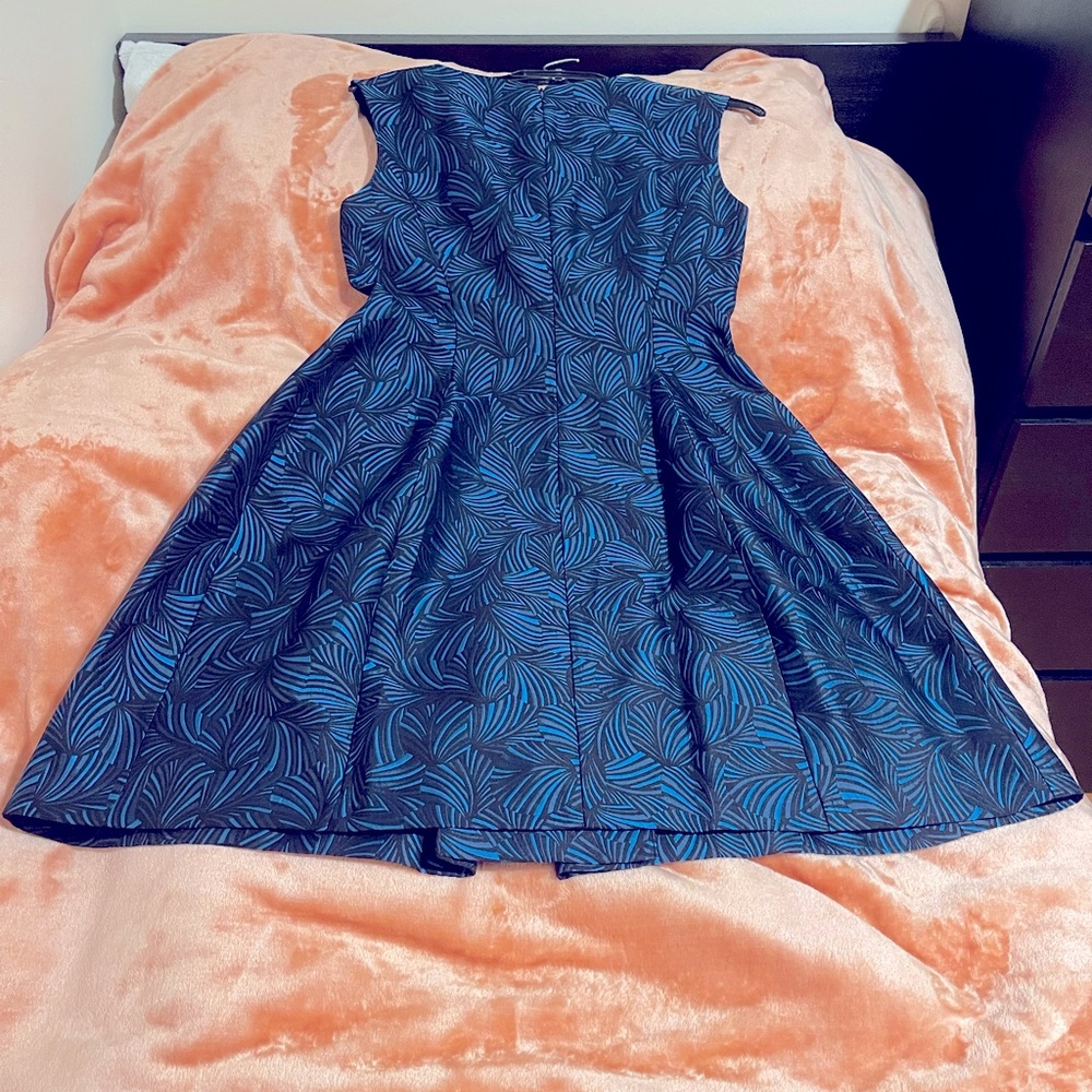 Beautiful A-line midi dress, new without tag, never worn. Lady’s find.